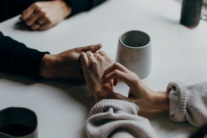 End-of-life wishes - two people holding hands